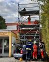 BildID: 3276 Übung PKW in Baugerüst